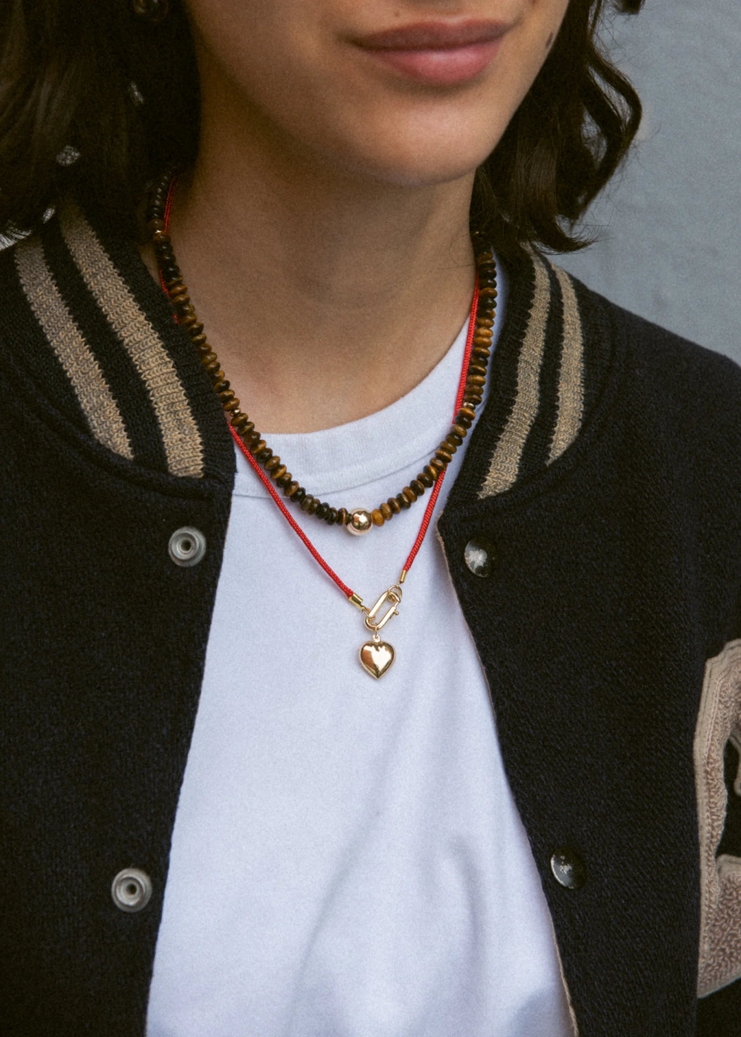 Flora - Collier 16 po rondelles œil de tigre avec bille centrale en or rempli